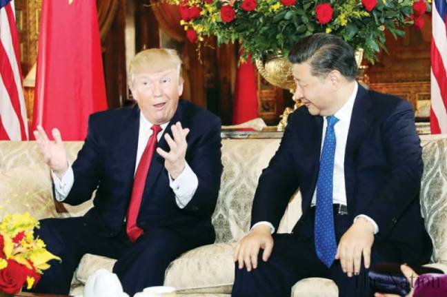 wary-trump-xi-measure-each-other-up-at-us-summit-1491606090-5321